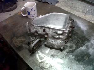 Welded sump plate and oil pick up